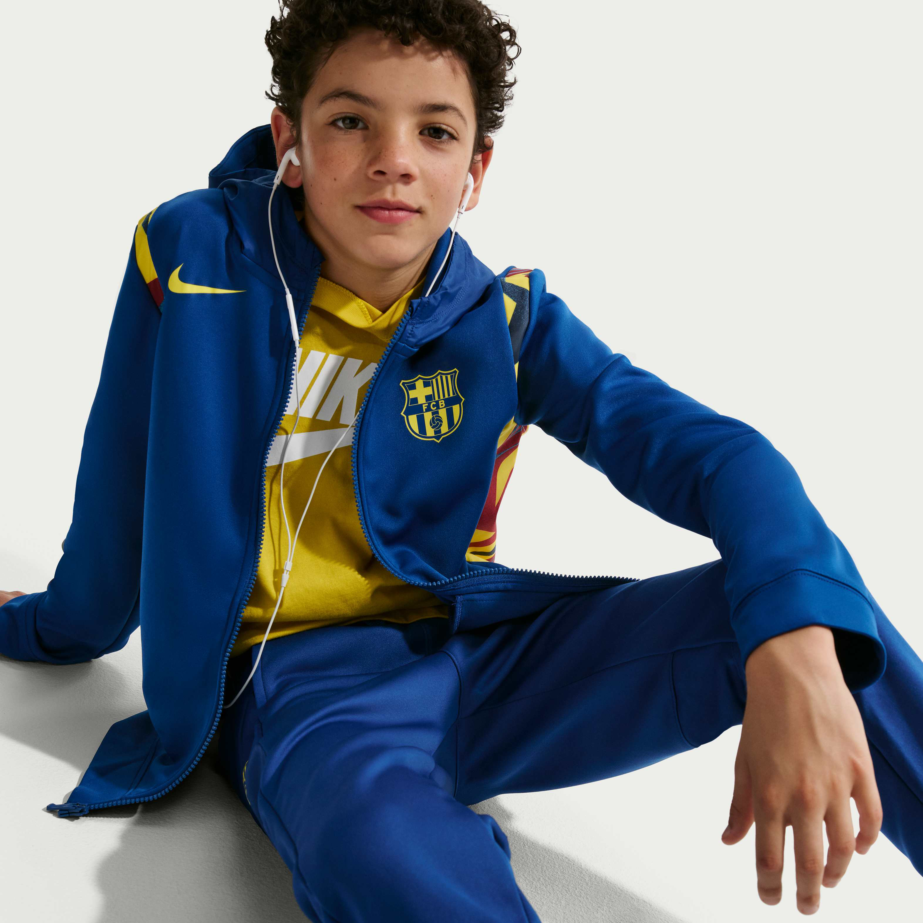 Buy F.C. Barcelona Older Kids' Nike Football Woven Tracksuit - Gym