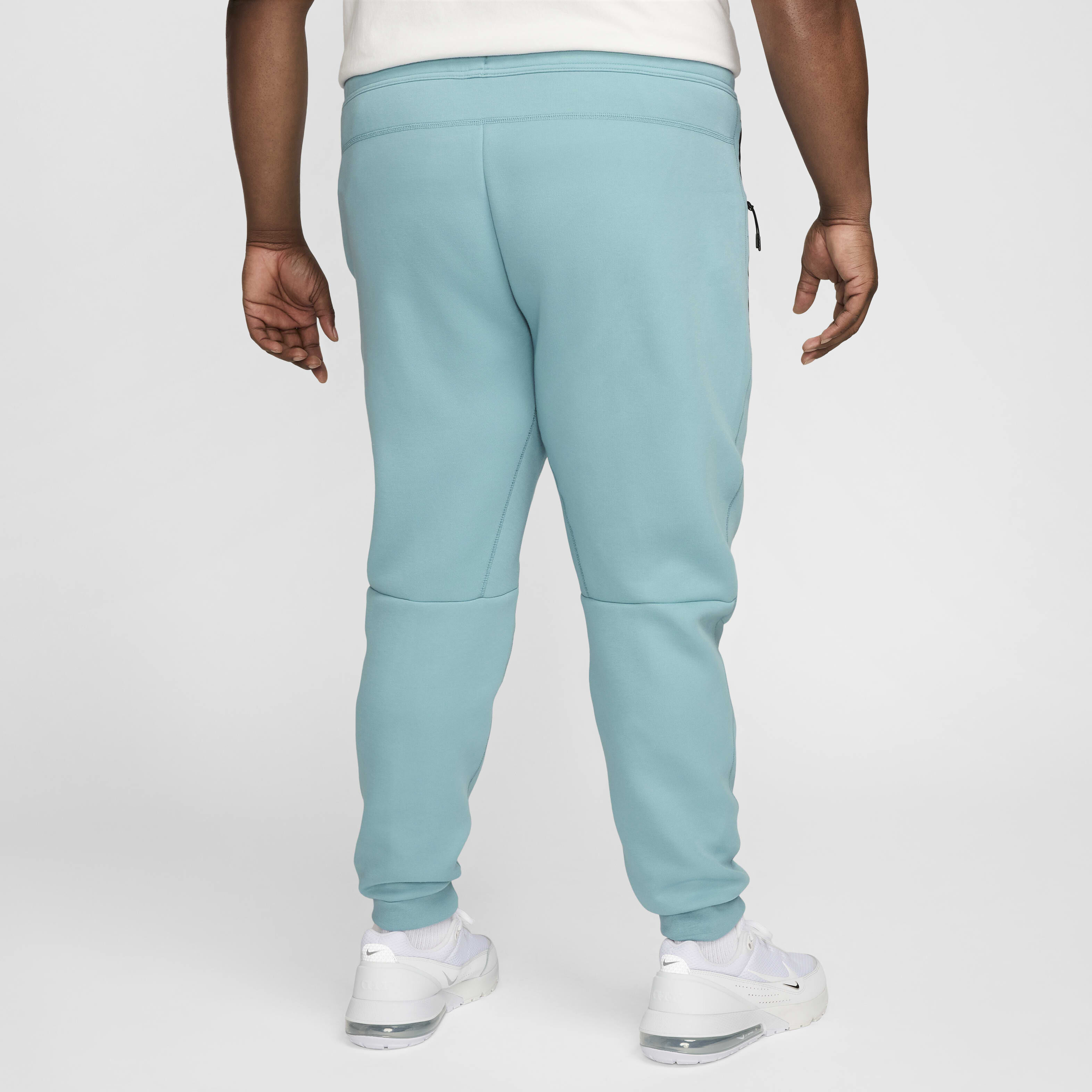 Blue nike tech pants new arrivals