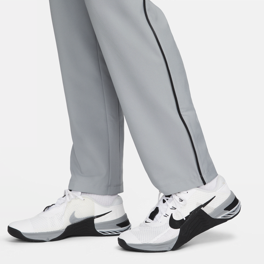 Shop Dri-FIT Men's Woven Team Training Trousers | Nike UAE
