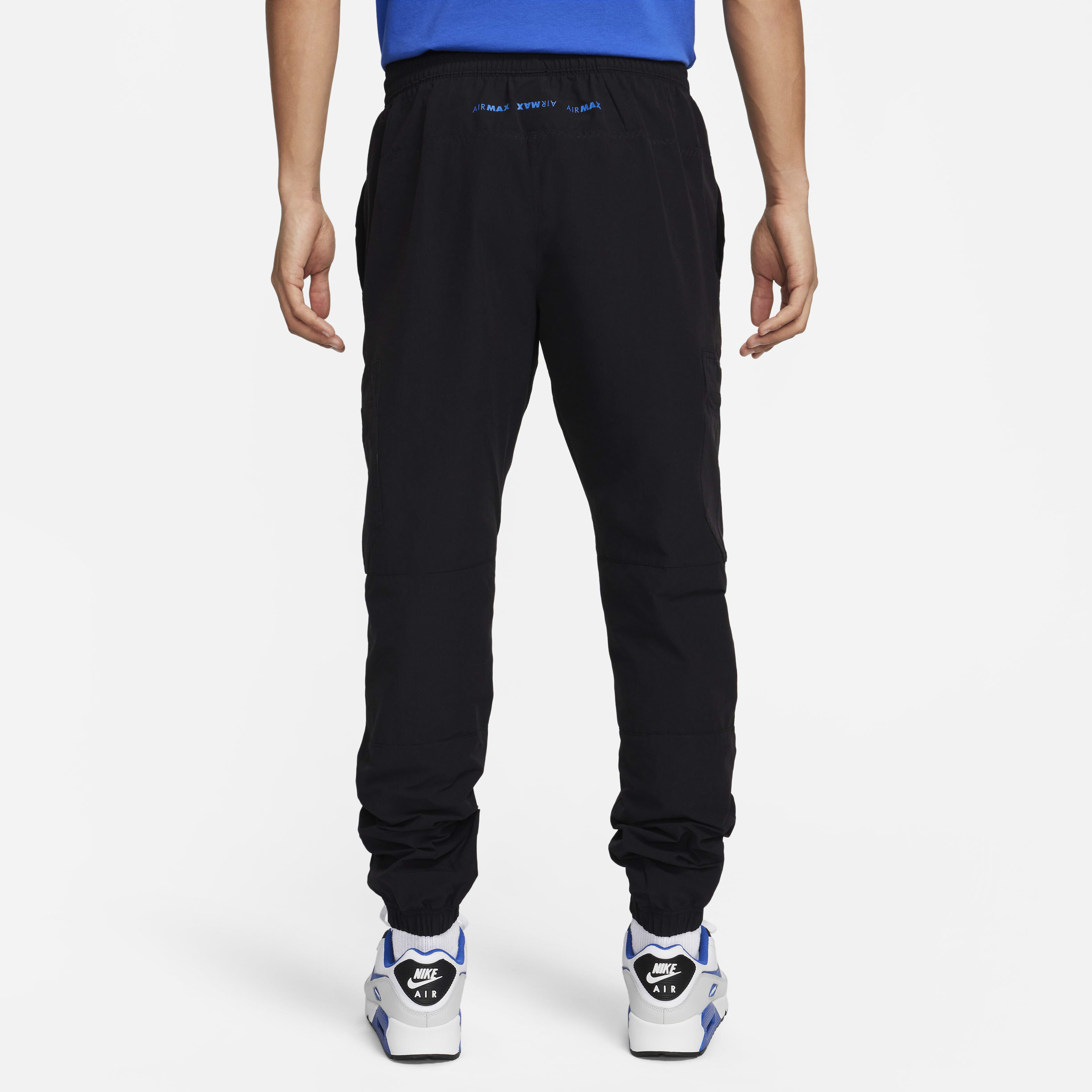 Nike woven track pants black online