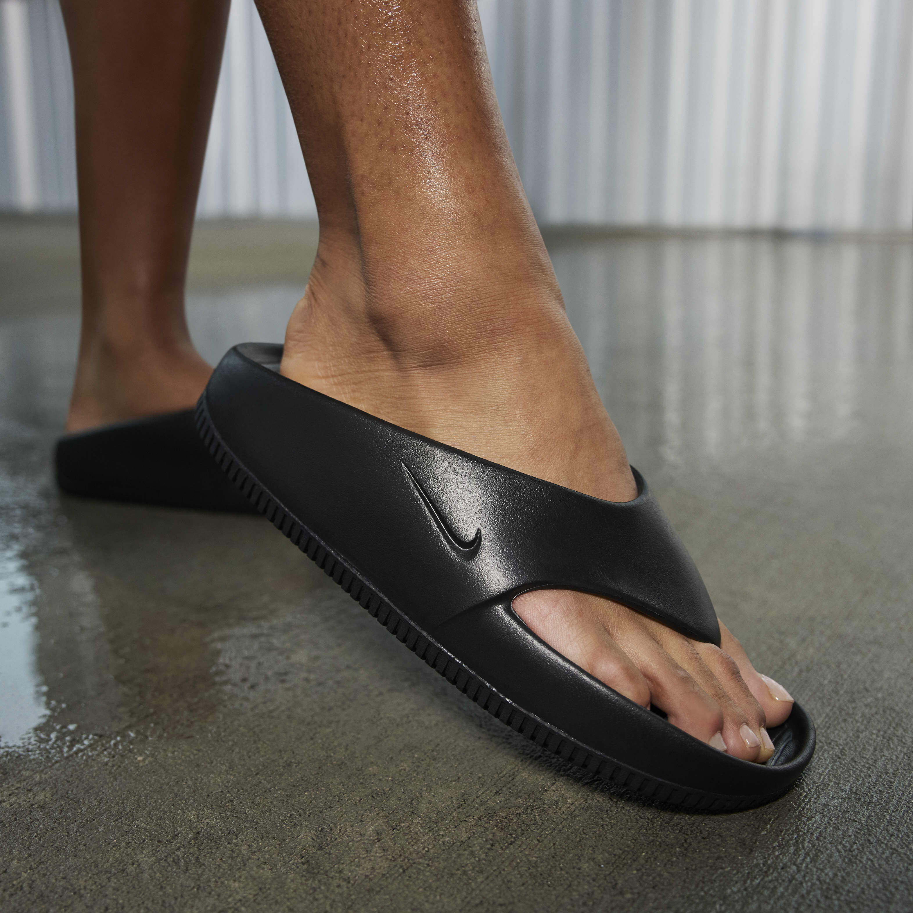Buy Nike Calm Women s Flip Flops Black Black Nike UAE Official