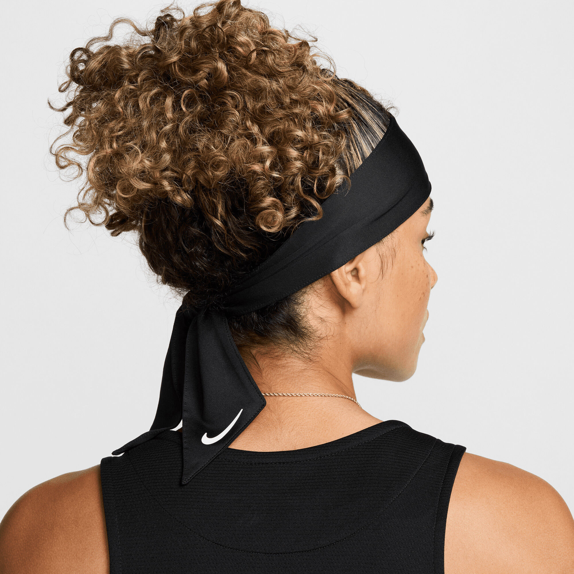 Buy WNBA Nike Dri-FIT Head Tie - Black/White @ Nike UAE